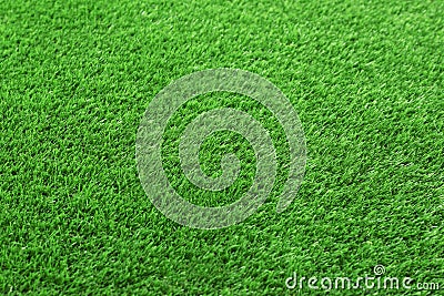 Artificial grass carpet as background, closeup. Stock Photo