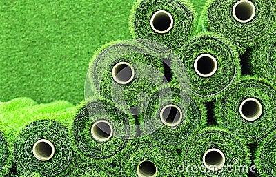 Artificial grass in rolls to cover tennis courts, sports fields, golf courses and football Stock Photo