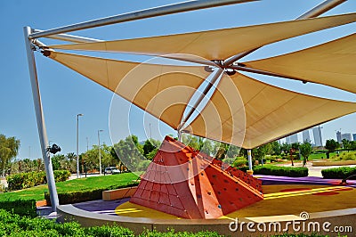 Artificial hill of pyramidal shape under triangle tends Editorial Stock Photo