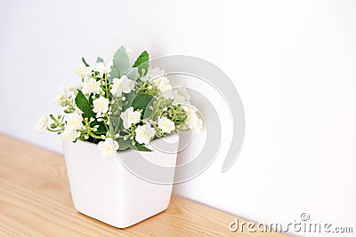 The artificial jasmine flower in the pot Stock Photo