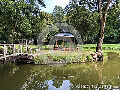 Artificial lake pond in the park of Pejacevic castle or Umjetno jezero ribnjak u perivoju dvorca Pejacevic Stock Photo