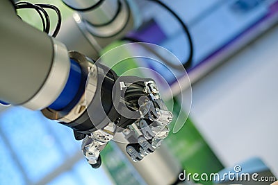 Artificial metal and plastic robotic hand Stock Photo