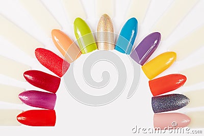 Artificial nails different colored with nail polish Stock Photo