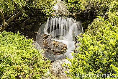 Artificial waterfall in Dow Gardens, Michigan Stock Photo