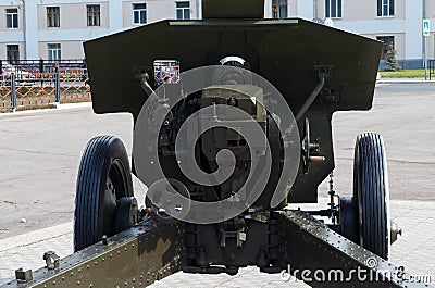 Artillery, gun mechanism controls, green artillery cannon close - up in the park, anti-tank guns during World War II Stock Photo