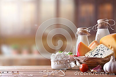 Artisanal dairy products in rustic kitchen front view Stock Photo