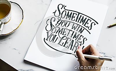 An artist creating hand lettering artwork Stock Photo