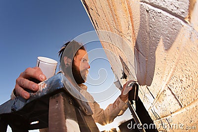 Artist Creating Mural Stock Photo