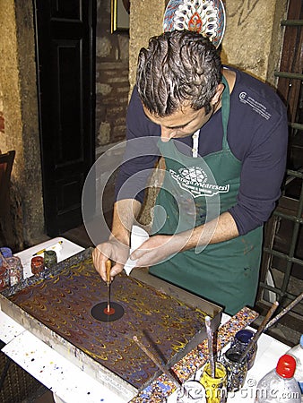 Artist doing the Turkish Art of Marbling, Istanbul Editorial Stock Photo
