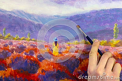 Artist hand with a brush closeup paints a beautiful picture paintntg Stock Photo