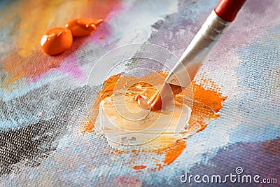 Artist hand painting Stock Photo
