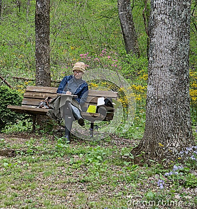 Artist in a Mountain Park Drawing Picture Editorial Stock Photo