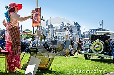 Artist paints car exhibited at Northwest Deuce Days Editorial Stock Photo
