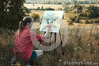 Artist on the plain air Stock Photo