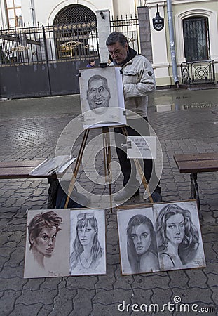 Artist selling paintings in the street,kazan,russian federation Editorial Stock Photo