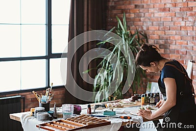 Artist workplace art craft female working studio Stock Photo