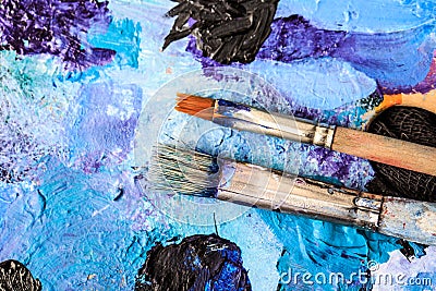 Artistic equipment. Brushes and paints for drawing. Items for children`s creativity. Stock Photo