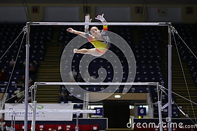 Artistic Gymnastics - Uneven bars Editorial Stock Photo