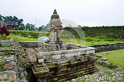 An artistic historical temple building for Petirtaan at the Liyangan Site, Indonesia. Editorial Stock Photo