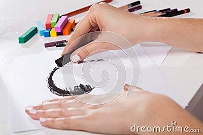 Artistic tools and woman painted pastel Stock Photo