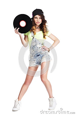 Artistic Woman in Jeans showing Retro Vinyl Record Stock Photo