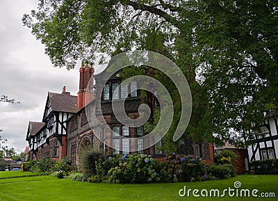 Arts and crafts style house in the village of Port Sunlight, Birkenhead, Wirral, United Kingdom Editorial Stock Photo