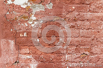 Artsy looking old salmon color painted brick wall texture with deterioration Stock Photo