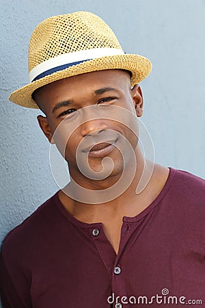 Artsy looking student smiling on campus Stock Photo