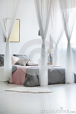 Canopy drapes in calm interior Stock Photo
