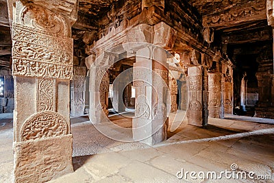 Artworks on columns of the Hindu temple, India. 7th century architecture in Pattadakal with decorations on stone reliefs Stock Photo