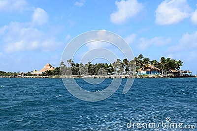 Aruba, Renaissance Island, Caribbean Sea. Sunny beach with white sand, coconut palm trees and turquoise sea. Summer vacation, Stock Photo