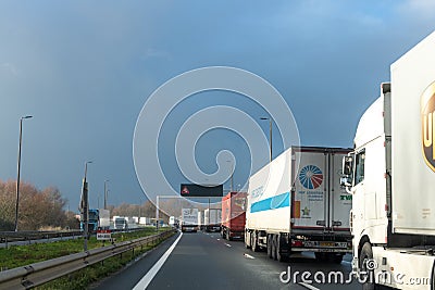 As brexit approaches, lines of trucks at the entrance to the Channel Tunnel Editorial Stock Photo