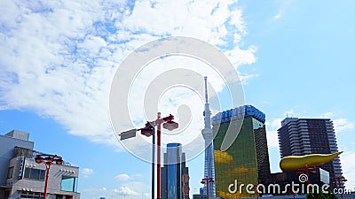 Asahi Beer Hall designer Philippe Starck, the buildings of the Asahi Breweries. Tokyo Skytree and Editorial Stock Photo