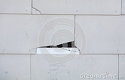 Asbestos siding cracking on home Stock Photo