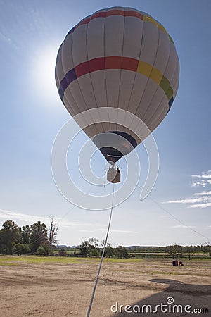 Ascending hot air balloon Stock Photo