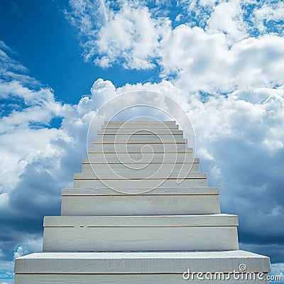 Ascent to success White ladder against the backdrop of the sky Stock Photo