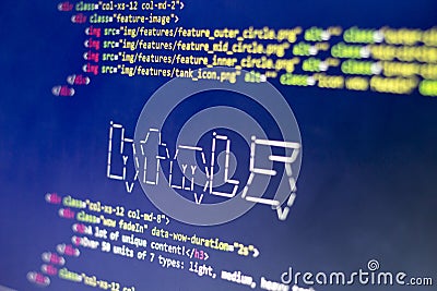 ASCII art of HTML technology name and real HTML code aside Editorial Stock Photo