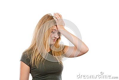 Ashamed embarrassed blonde woman with hand on face Stock Photo