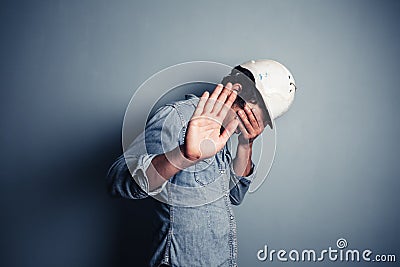 Ashamed worker Stock Photo