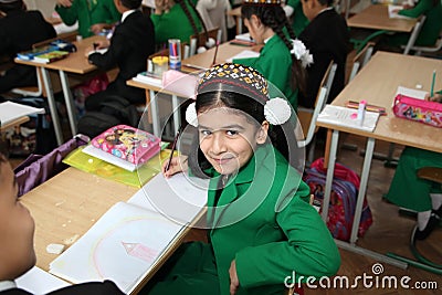 Ashgabad, Turkmenistan - November 4, 2014. Portrait of an unknown schoolgirl in the classroom. November 4, 2014. In schools Editorial Stock Photo