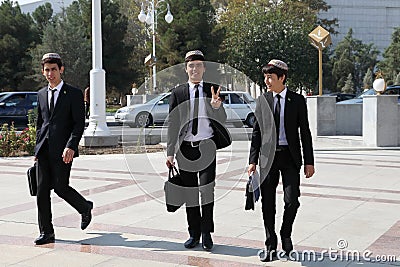 Ashgabad, Turkmenistan - October 10, 2014. Group of cheerful st Editorial Stock Photo