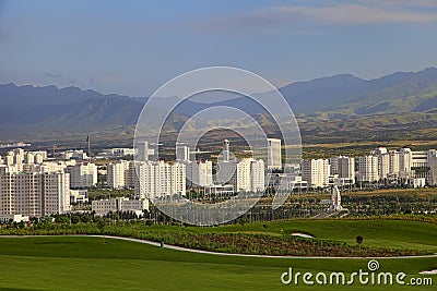 ASHGABAT, TURKMENISTAN. View of the new neighborhood on a background of mountains Editorial Stock Photo