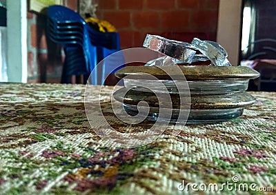 Ashtray on wooden table on a farm Stock Photo