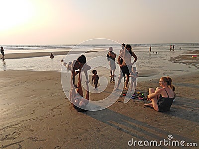 Ashvem beach yoga on sunset. Goa, India Editorial Stock Photo