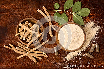 Ashwagandha superfood powder and root. Stock Photo