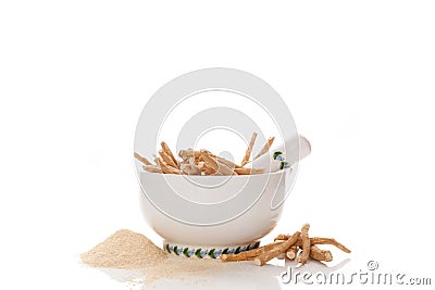 Ashwagandha supplement. Root and powder. Stock Photo