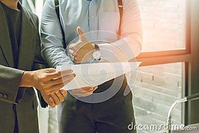 Asia Businessman together create a mutually beneficial business relationship. Economic graph on office Stock Photo