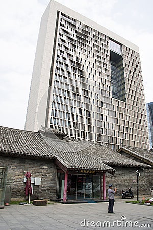 Asia China, Beijing, nanxincang cultural leisure Street,Modern tall buildings and ancient barn Editorial Stock Photo