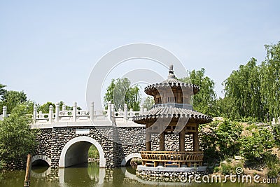 Asia Chinese, Beijing, Yu Garden,Classical garden architecture,Wooden pavilion, stone bridge Editorial Stock Photo