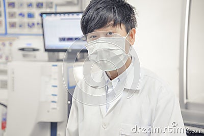 Asia scientist work in white Stock Photo